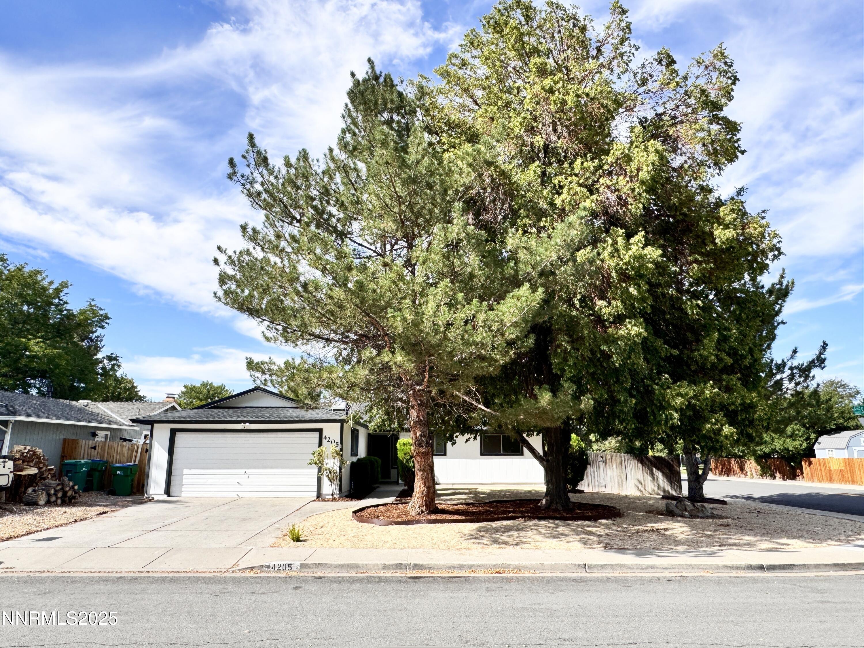 4205 Santa Maria Drive Reno, NV 89502 - Photo 2 of 23 a view of a street with houses