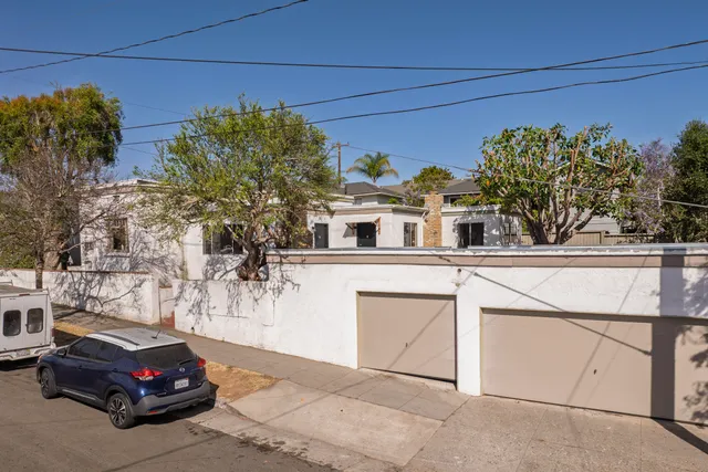 a car parked in front of a house