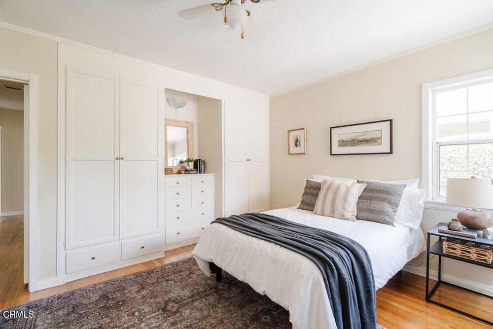 1795 Sonoma Drive Altadena, CA 91001 - Photo 11 of 29 a bedroom with a bed and a chandelier