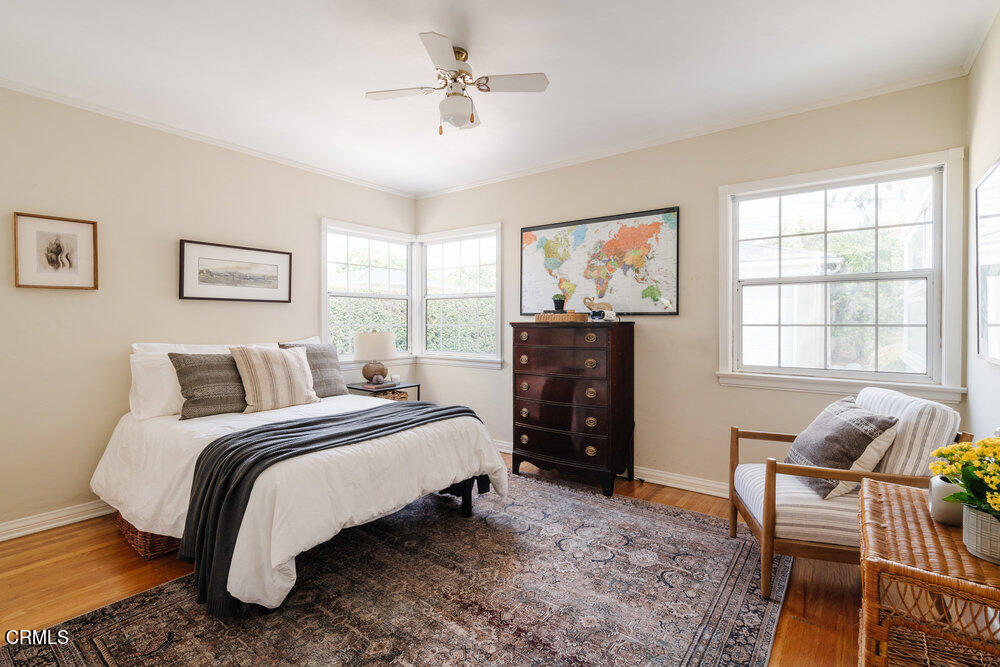 1795 Sonoma Drive Altadena, CA 91001 - Photo 13 of 29 a spacious bedroom with a bed a couch and a window