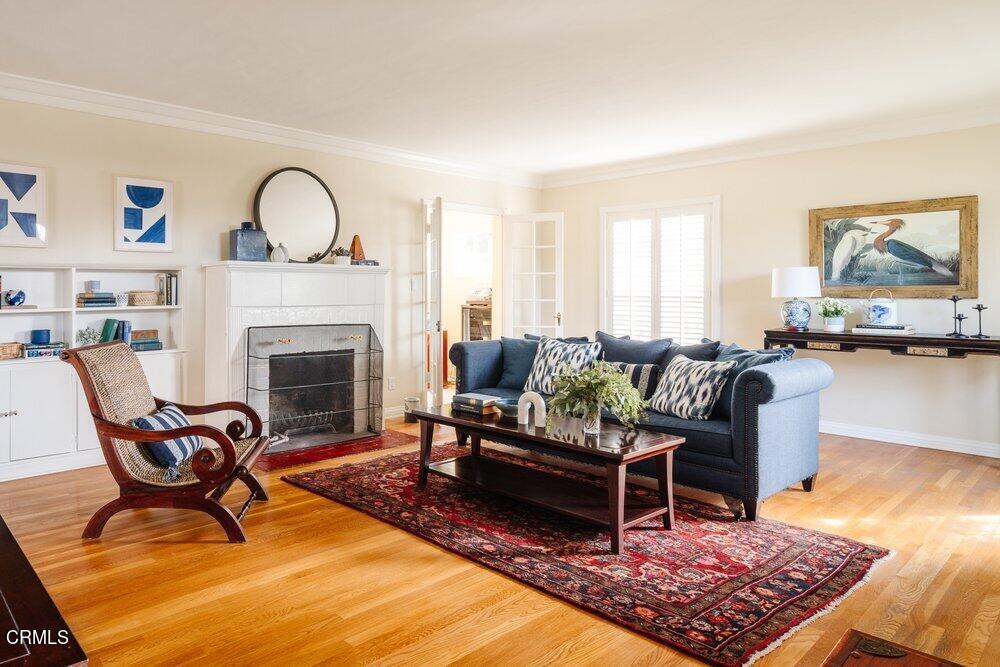 1795 Sonoma Drive Altadena, CA 91001 - Photo 2 of 29 a living room with furniture a rug and a fireplace