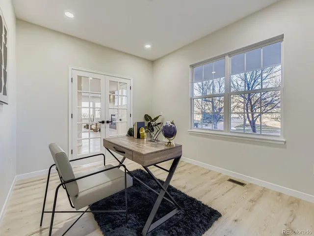 a view of a livingroom with furniture and window