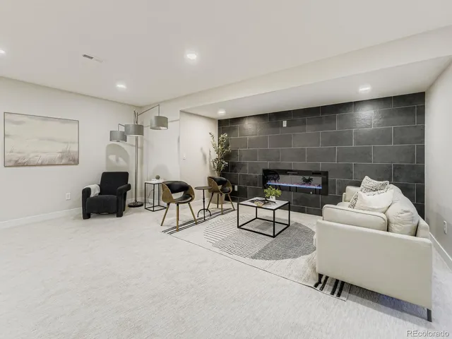 a living room with furniture and a couch