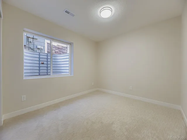 an empty room with a window