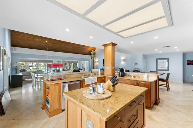 a view of a dining room with furniture and a table