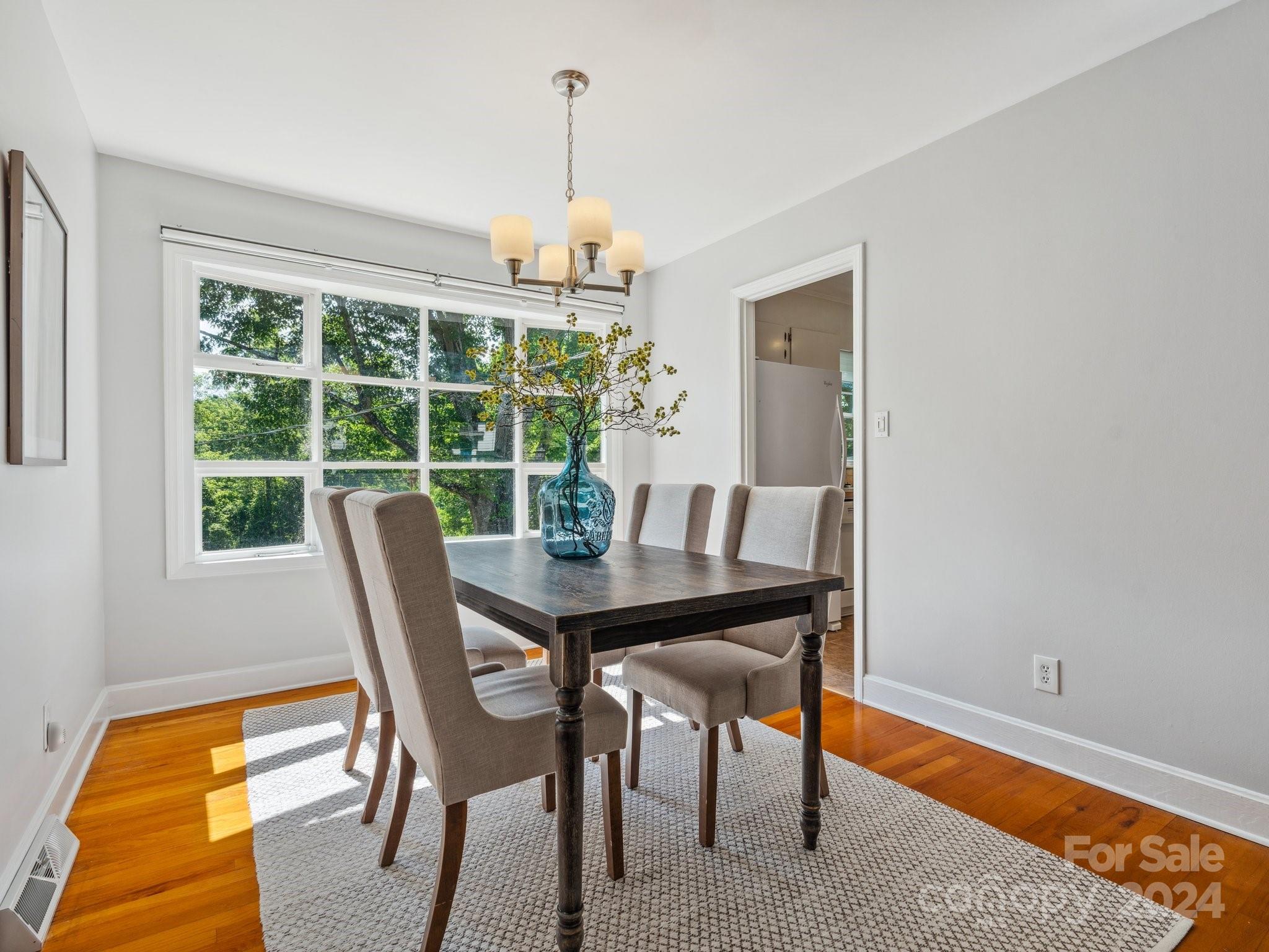 7631 Watercrest Road Charlotte, NC 28210 - Photo 7 of 42 a view of a dining room with furniture window and outside view