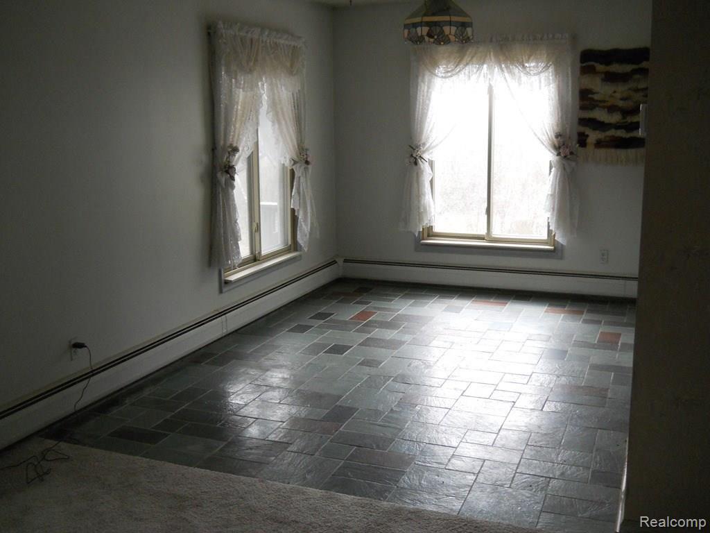 3321 Bishop Road Dryden, MI 48428 - Photo 7 of 27 Dining room, slate floor off kitchen.