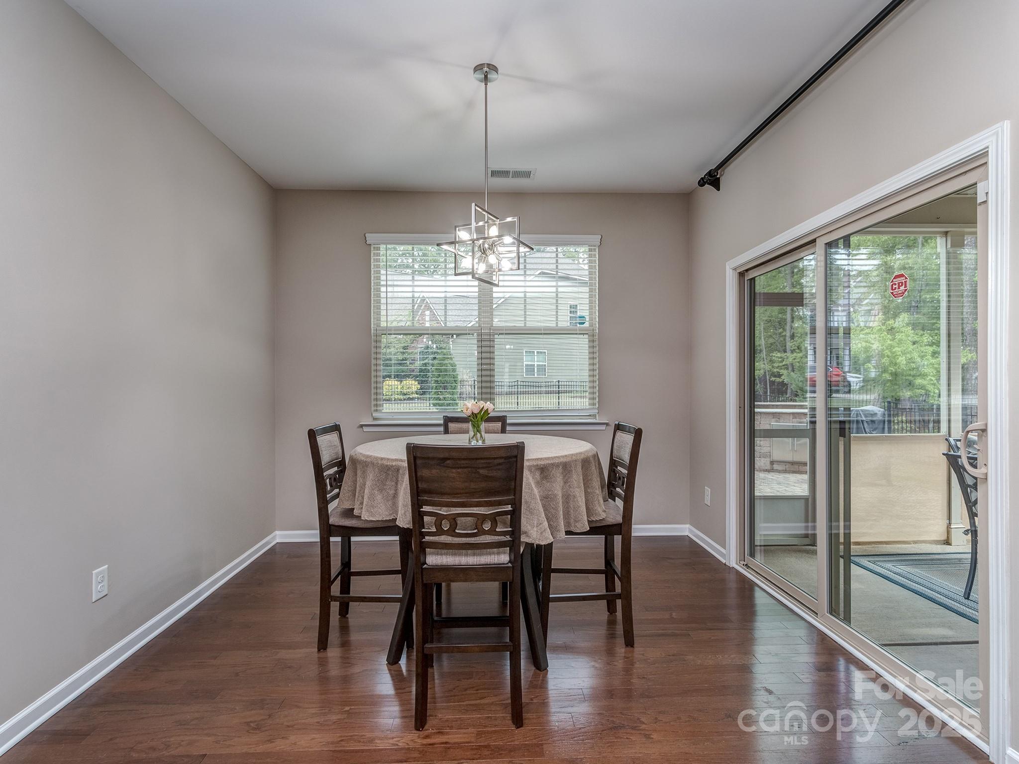 140 Halifax Drive Fort Mill, SC 29707 - Photo 14 of 38 a dining room with furniture window wooden floor