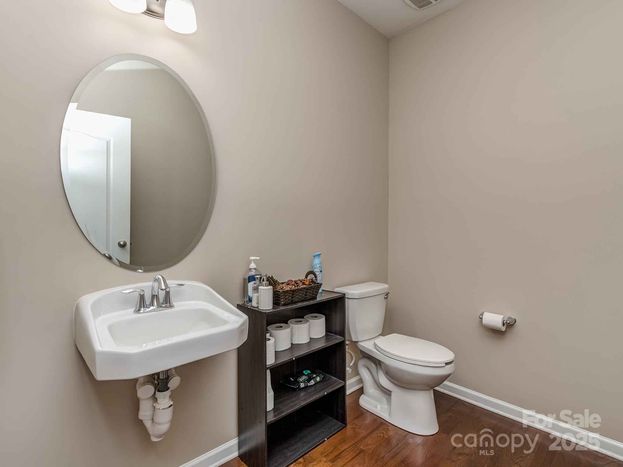 140 Halifax Drive Fort Mill, SC 29707 - Photo 17 of 38 a bathroom with a toilet sink and mirror