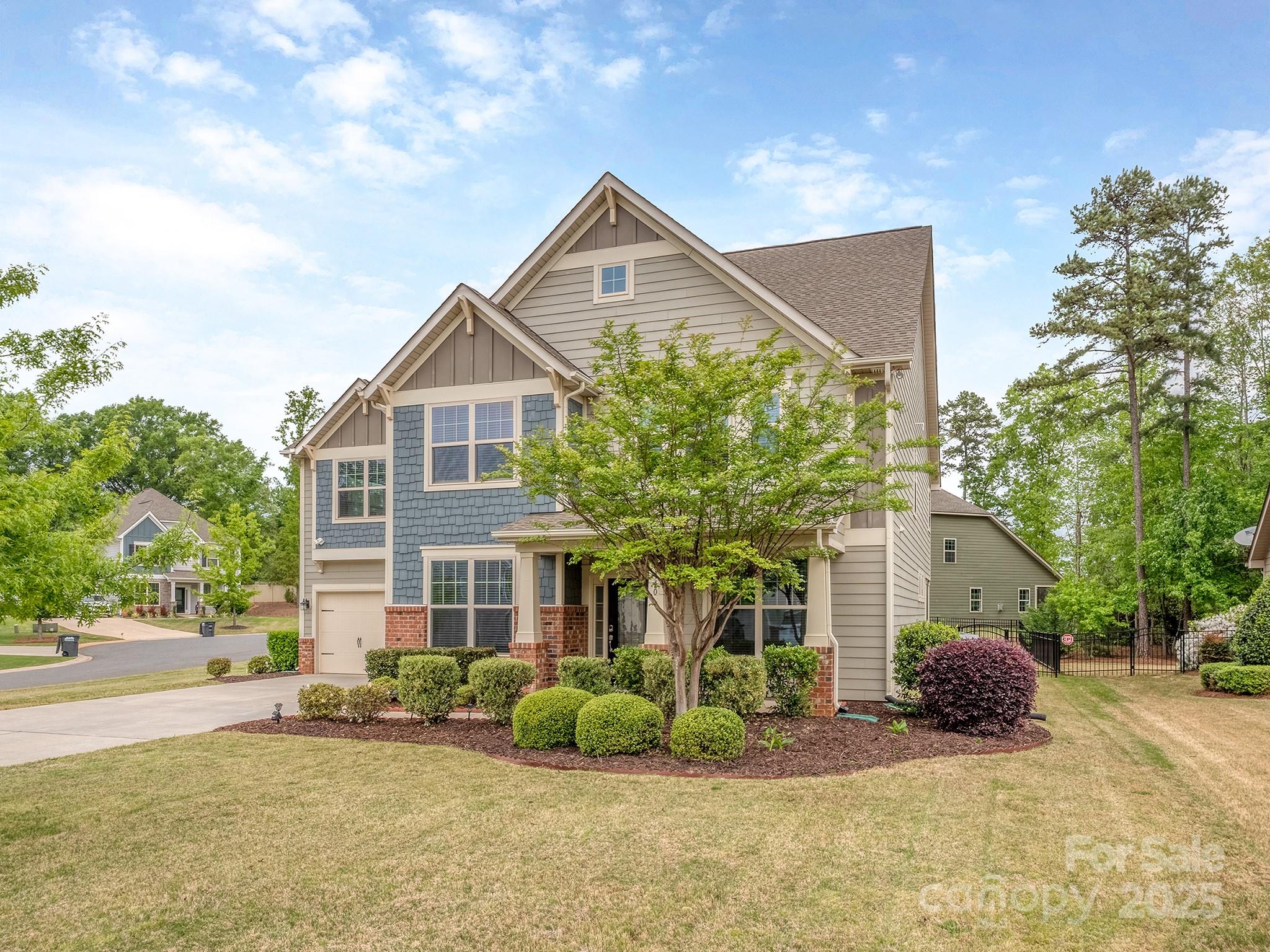 140 Halifax Drive Fort Mill, SC 29707 - Photo 2 of 38 a front view of a house with garden