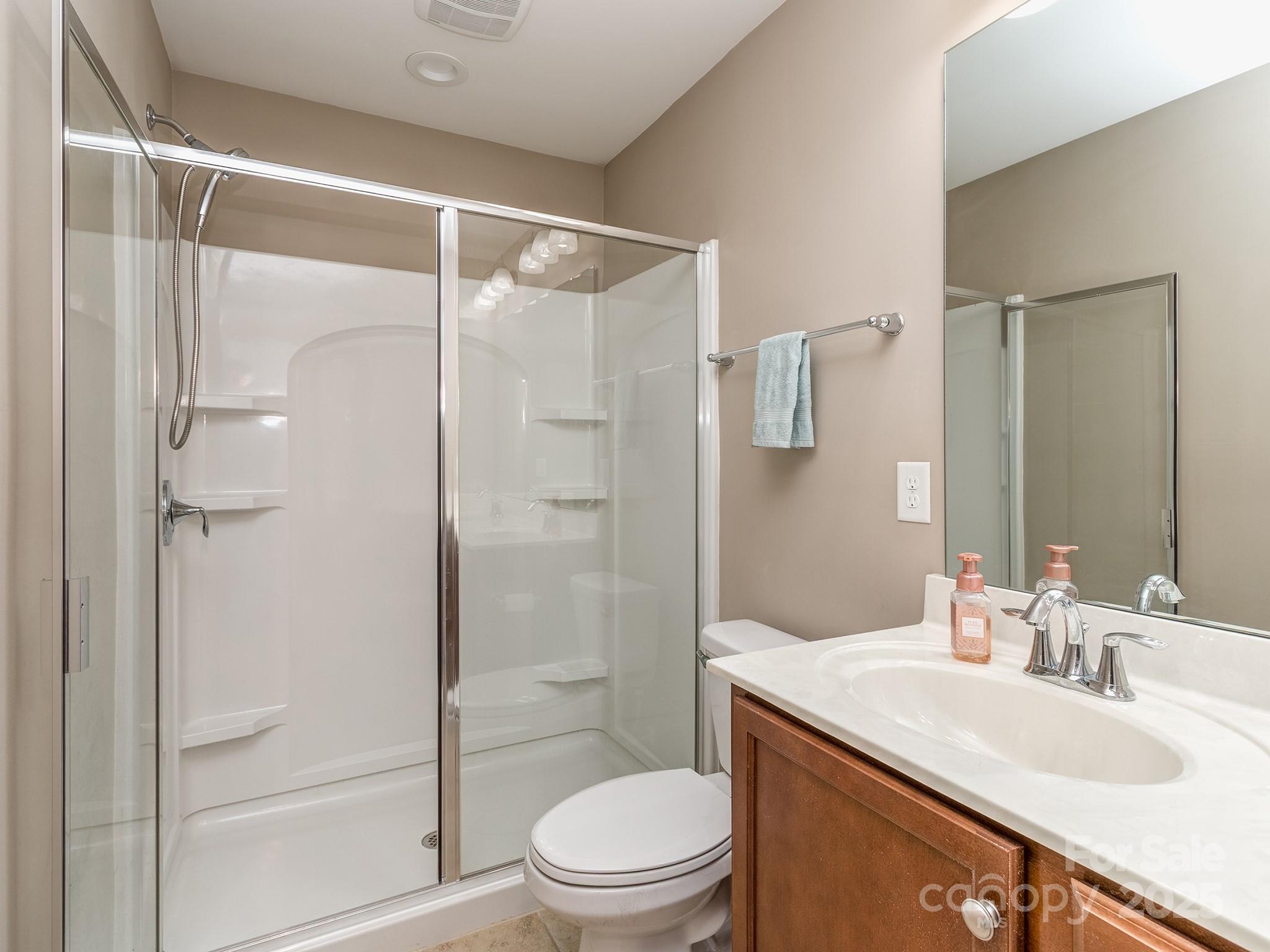 140 Halifax Drive Fort Mill, SC 29707 - Photo 21 of 38 a bathroom with a sink toilet and shower