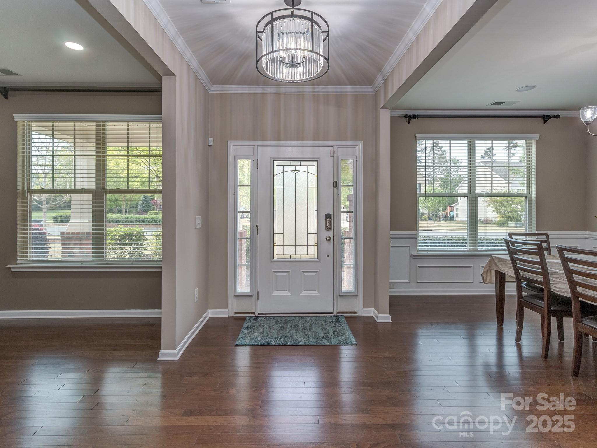 140 Halifax Drive Fort Mill, SC 29707 - Photo 3 of 38 a view of empty room with wooden floor and fan