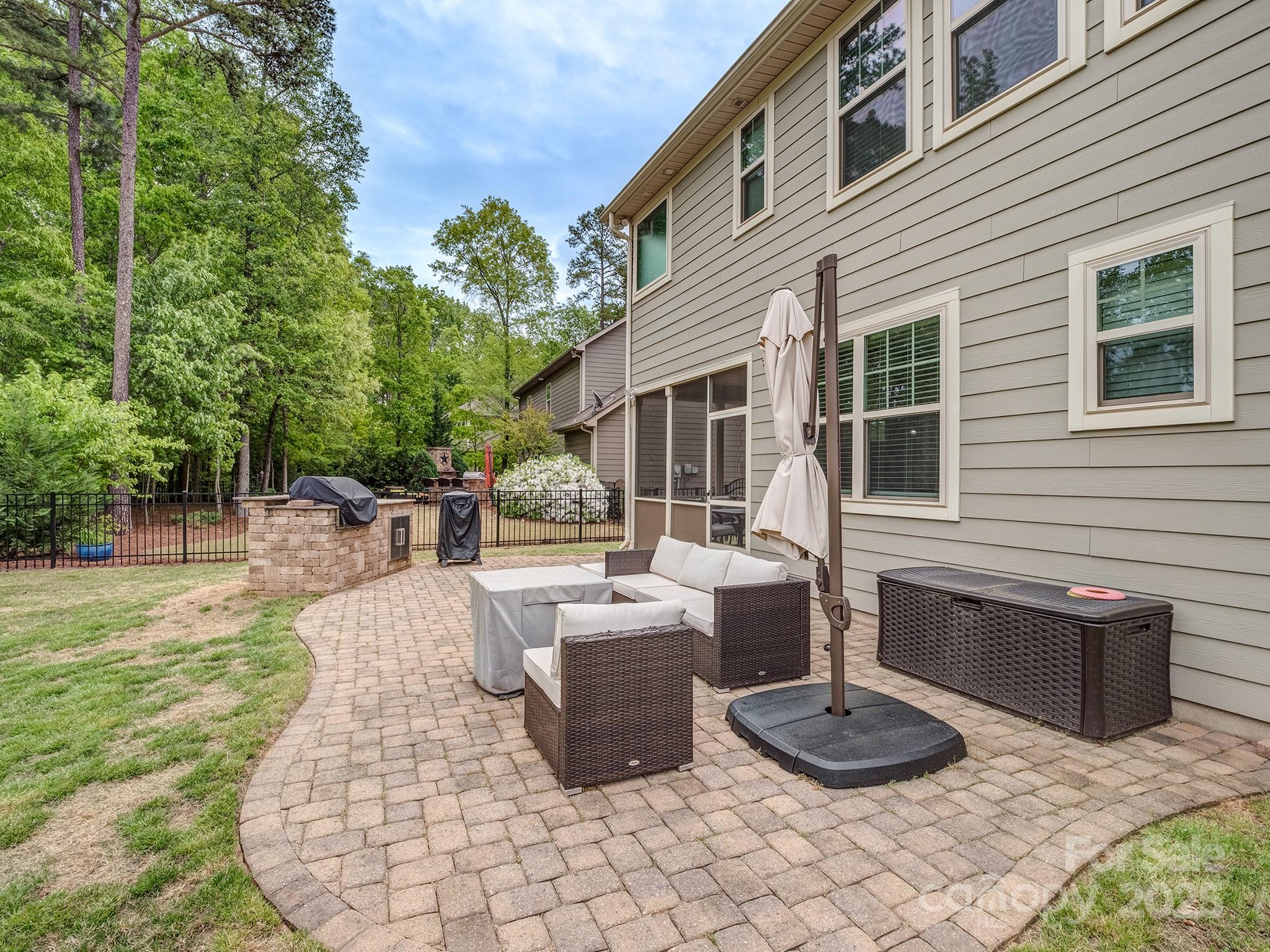 140 Halifax Drive Fort Mill, SC 29707 - Photo 33 of 38 a view of a patio with couches chairs and potted plants