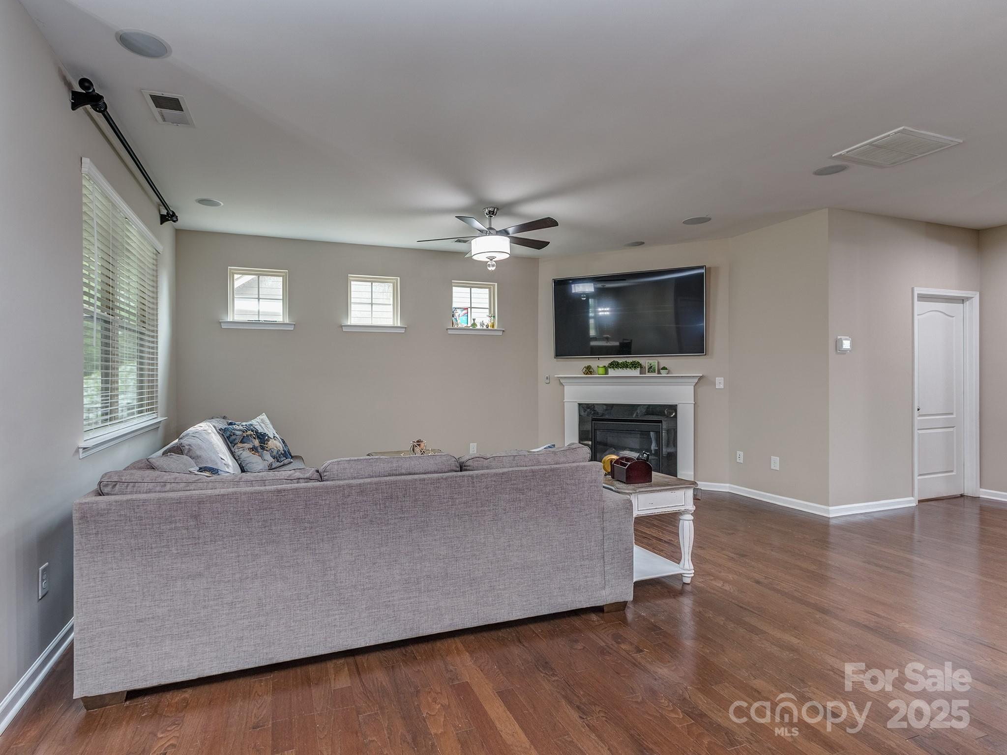 140 Halifax Drive Fort Mill, SC 29707 - Photo 8 of 38 a living room with furniture and a flat screen tv