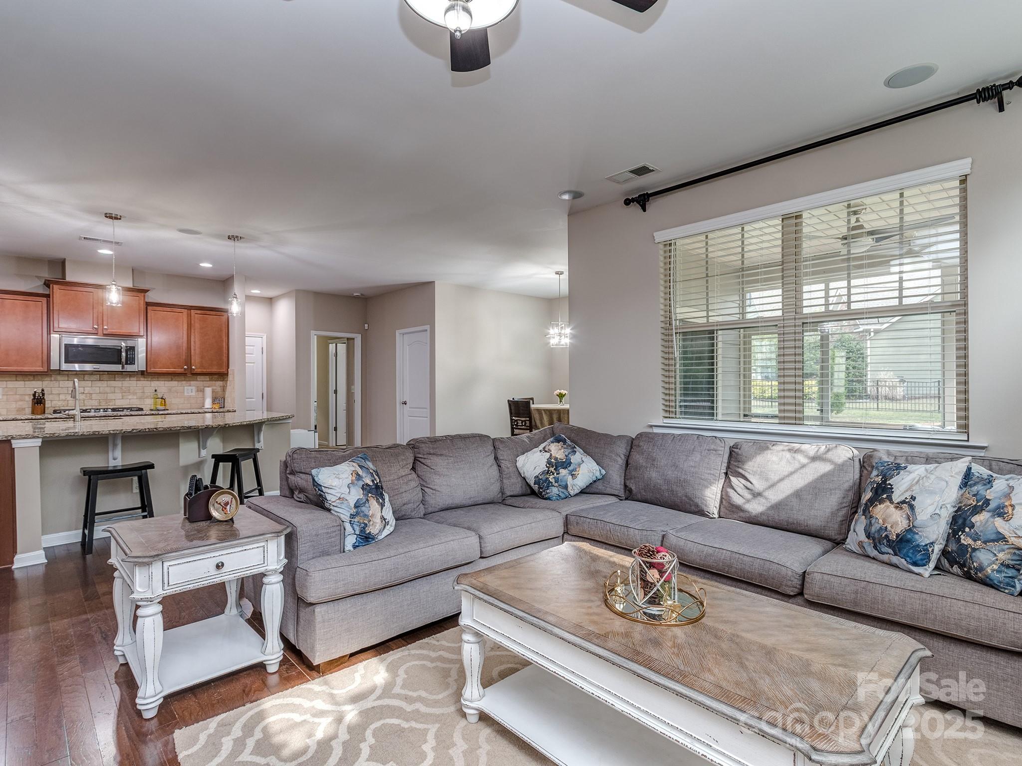 140 Halifax Drive Fort Mill, SC 29707 - Photo 9 of 38 a living room with furniture and a large window