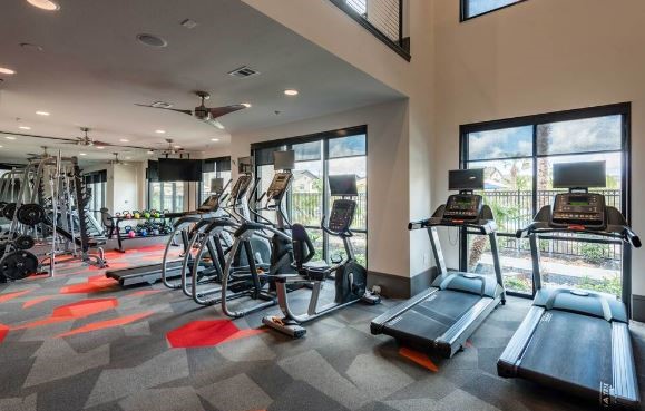 1930 Kingsley Drive, Unit 2214 Pearland, TX 77584 - Photo 6 of 6 a view of a room with gym equipment