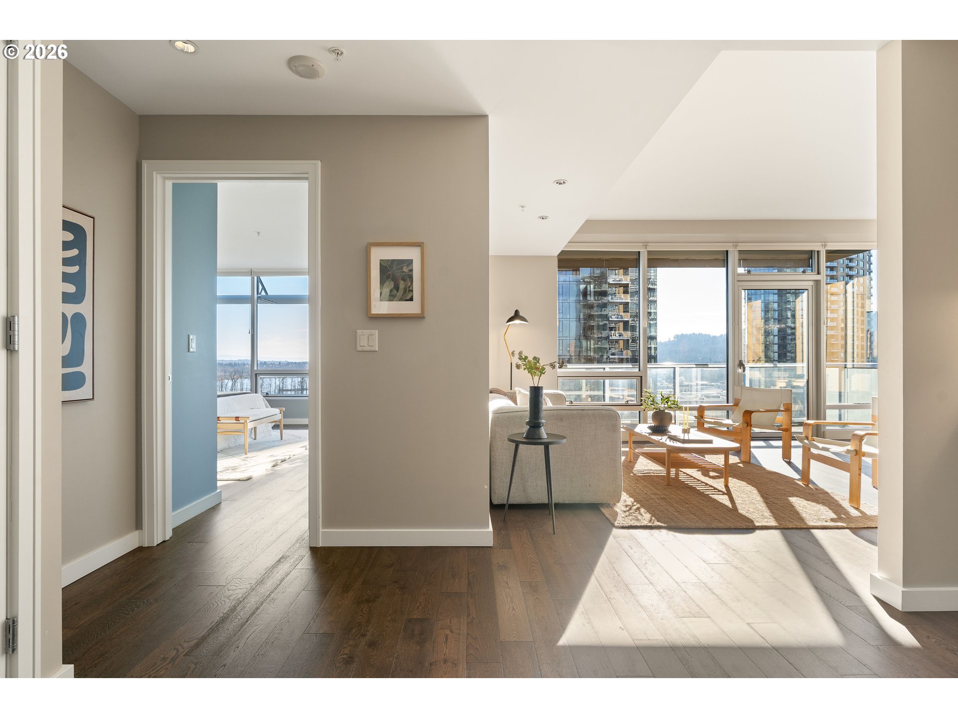 836 South Curry Street, Unit 1304 Portland, OR 97239 - Photo 13 of 34 a living room with furniture and a table