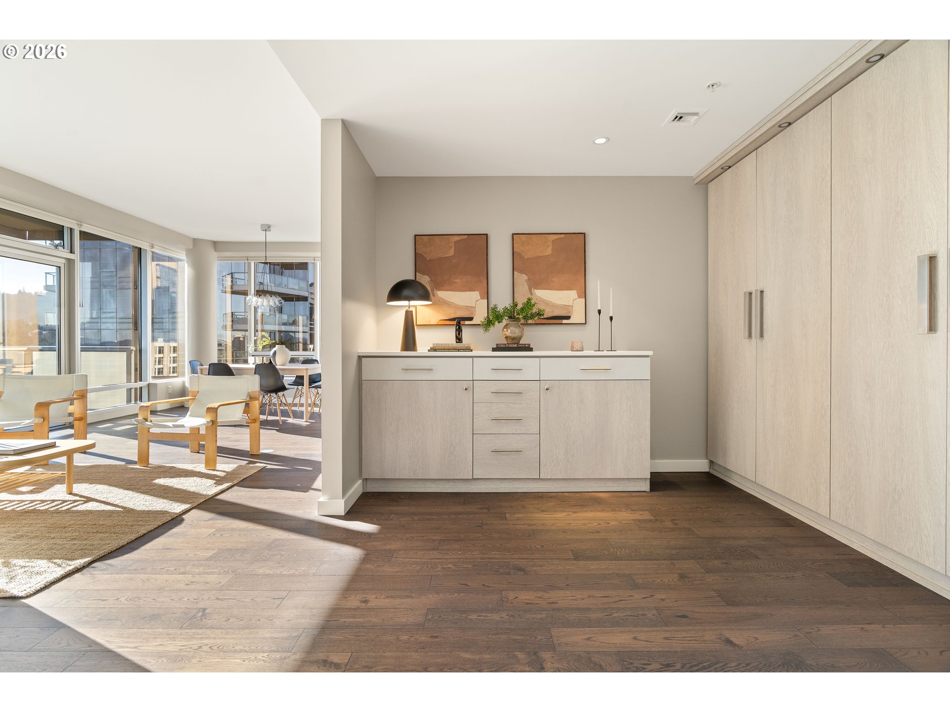 836 South Curry Street, Unit 1304 Portland, OR 97239 - Photo 14 of 34 a living room with kitchen island granite countertop furniture and a fireplace