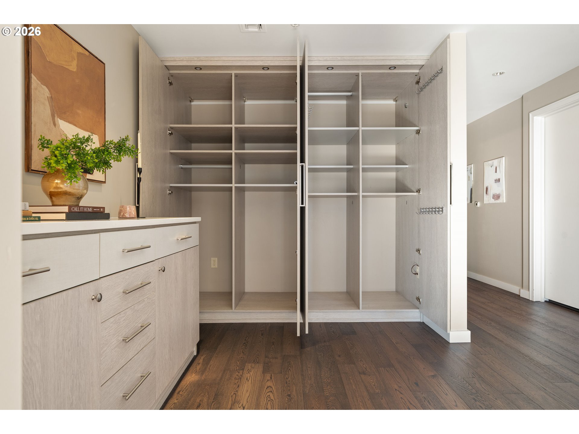 836 South Curry Street, Unit 1304 Portland, OR 97239 - Photo 16 of 34 a kitchen with a refrigerator and white cabinets