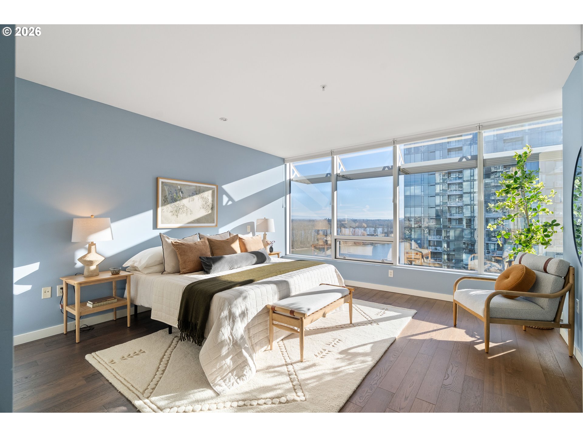 836 South Curry Street, Unit 1304 Portland, OR 97239 - Photo 17 of 34 a bed room with a bed and a couch