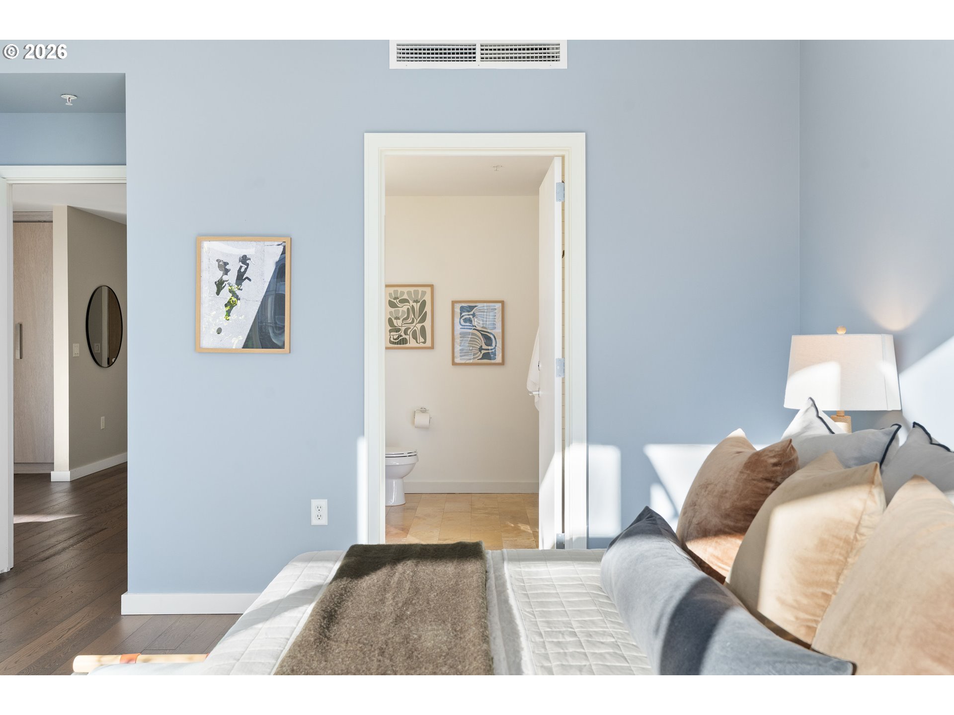 836 South Curry Street, Unit 1304 Portland, OR 97239 - Photo 21 of 34 a bedroom with a bed and a table