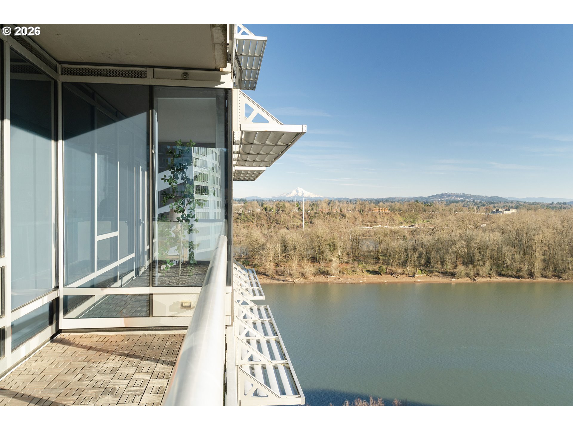 836 South Curry Street, Unit 1304 Portland, OR 97239 - Photo 5 of 34 a picture of floor to ceiling window and an outdoor view