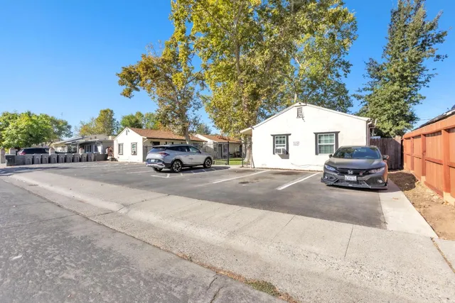 a car parked in front of a house