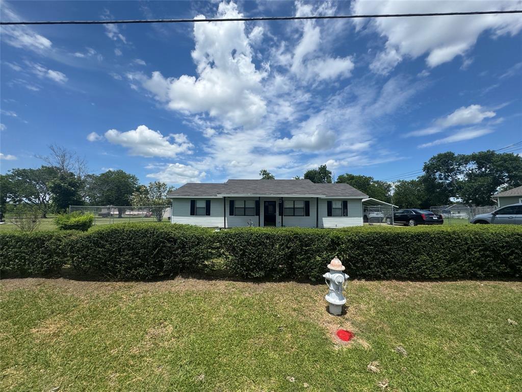207 College Mound Road Terrell, TX 75160 - Photo 2 of 14 Single-story residence featuring a light-colored exterior, dark shutters, and a dark shingled roof