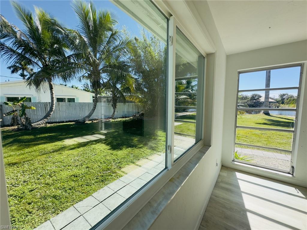 22 Constitution Drive Naples, FL 34112 - Photo 15 of 30 a view of swimming pool from a window
