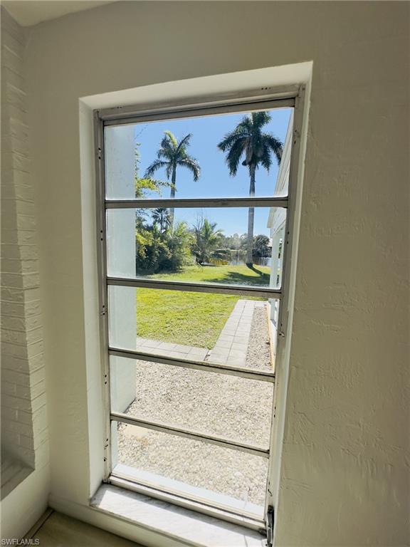22 Constitution Drive Naples, FL 34112 - Photo 17 of 34 a view of wooden door