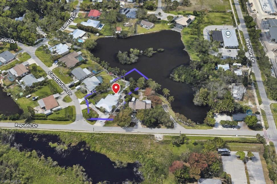 22 Constitution Drive Naples, FL 34112 - Photo 33 of 34 an aerial view of a house