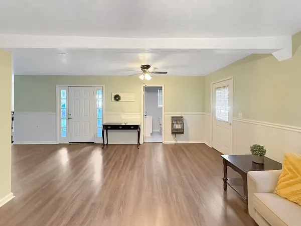 a view of livingroom with furniture and wooden floor