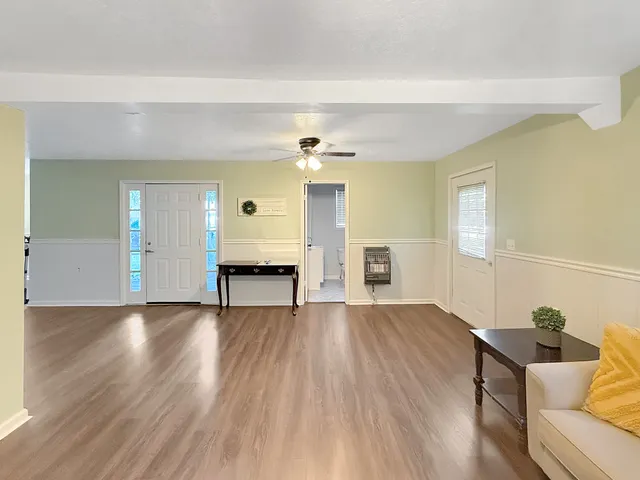 a view of livingroom with furniture and wooden floor
