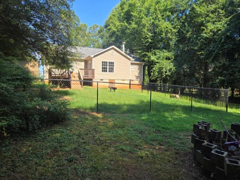 805 Gose Road Forsyth, GA 31029 - Photo 26 of 29 a view of a house with backyard and garden