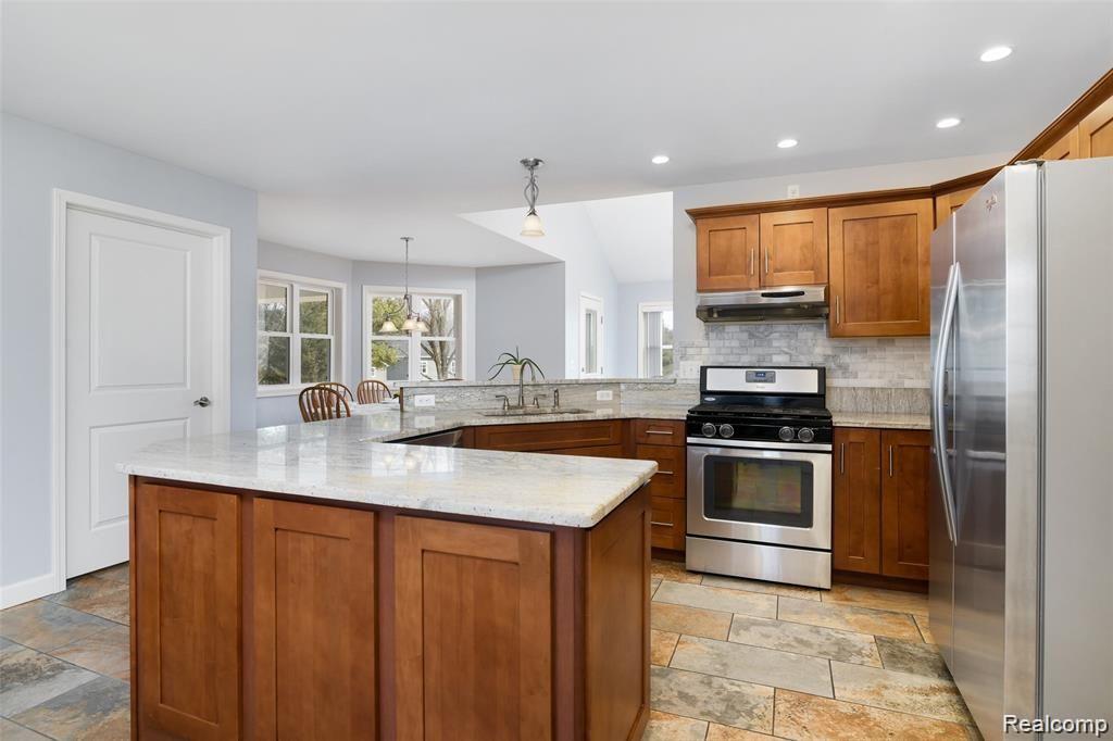 5055 Pleasant Lake Road Howell, MI 48843 - Photo 4 of 35