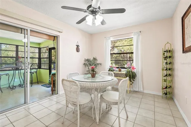 a view of an chairs and tables in the balcony