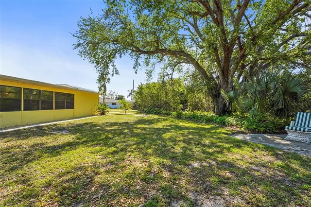 an aerial view of residential building with parking space