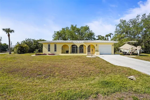 view of a house with a yard
