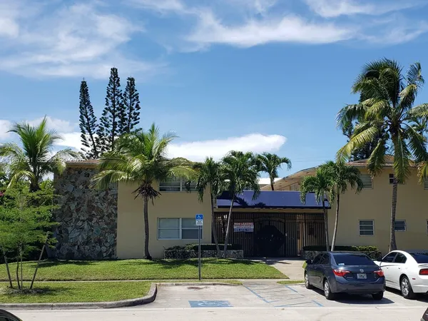 a car parked in front of a house