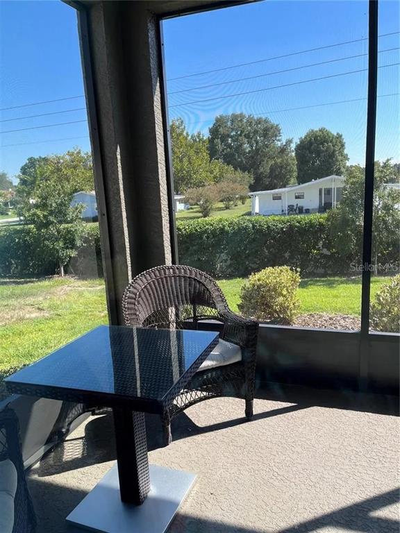 9879 Southwest 99th Loop Ocala, FL 34481 - Photo 12 of 12 a view of swimming pool from a back yard