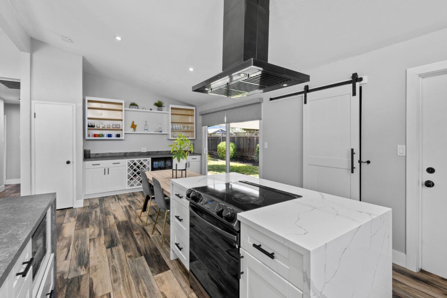 1430 Spruce Street Livermore, CA 94551 - Photo 14 of 32 a kitchen that has a cabinets and a stove in it
