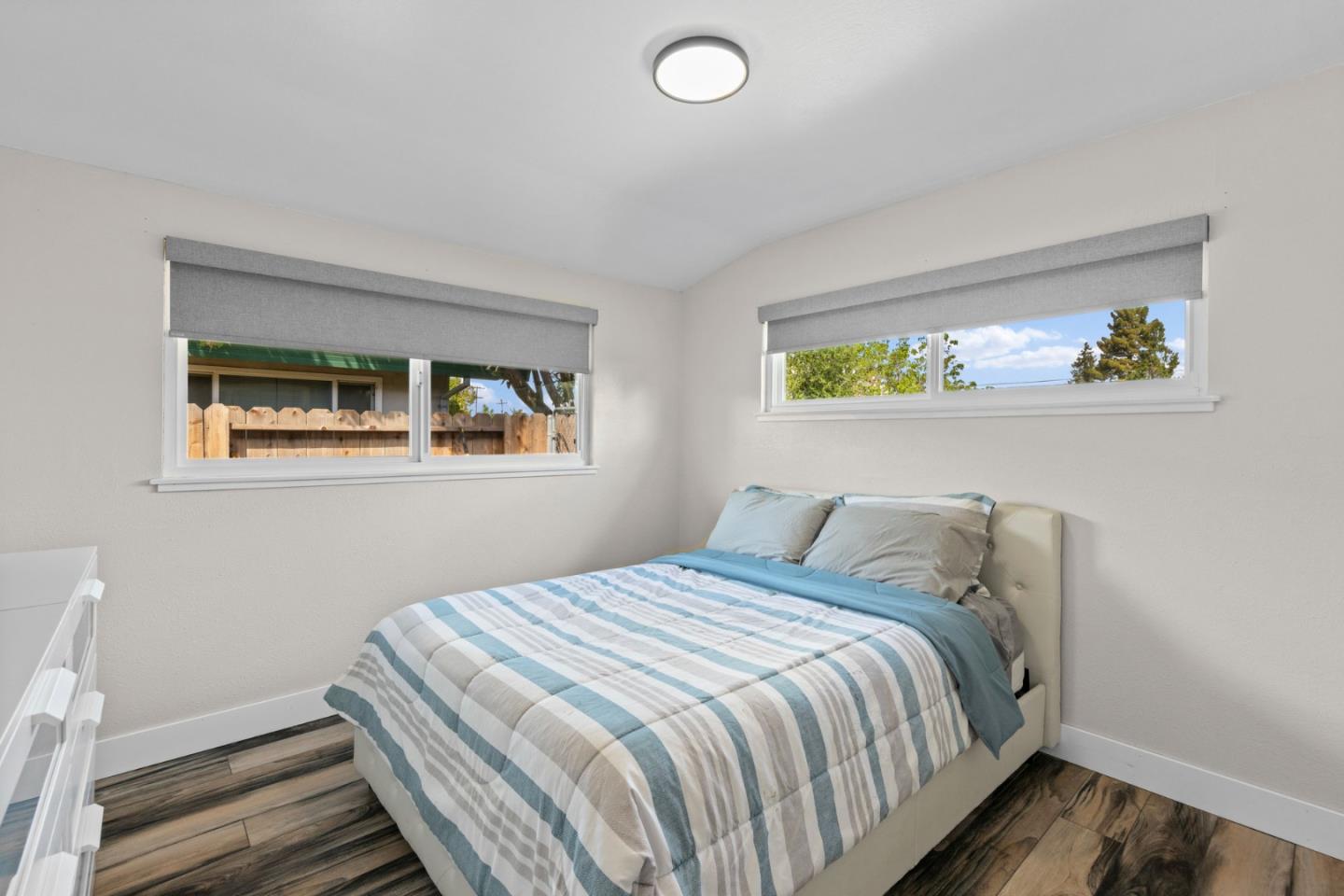 1430 Spruce Street Livermore, CA 94551 - Photo 20 of 32 a bedroom with a bed and painting on the wall