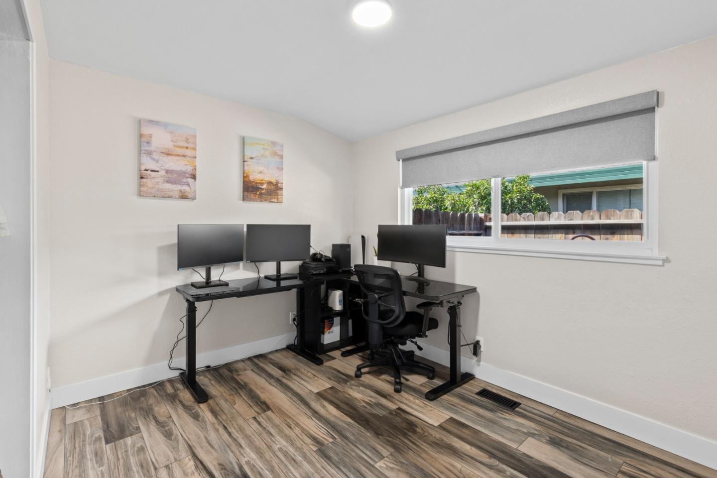 1430 Spruce Street Livermore, CA 94551 - Photo 22 of 32 a view of a workspace with furniture and a window