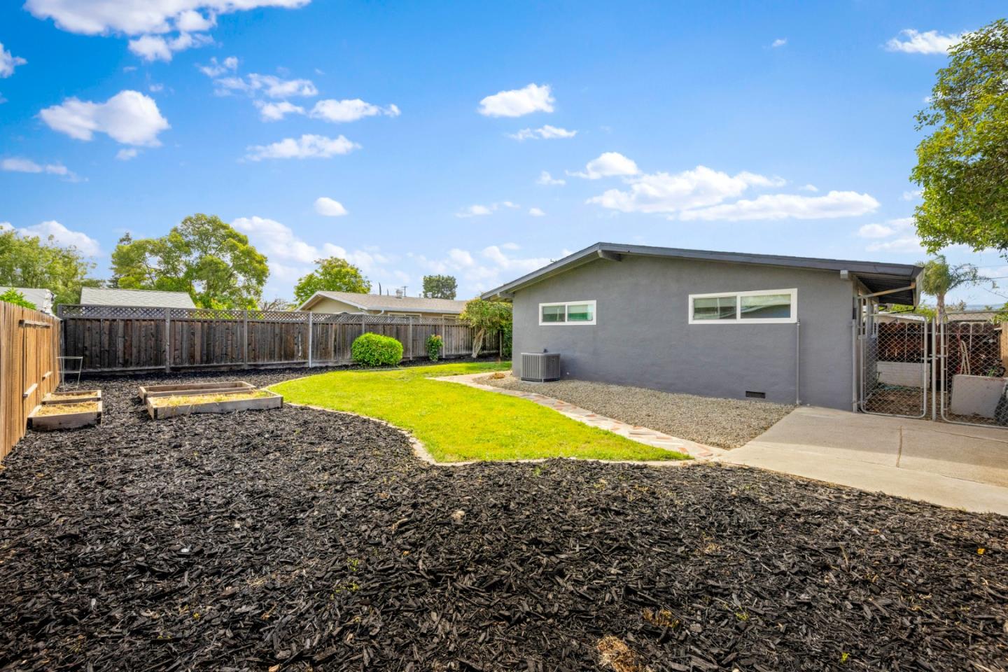 1430 Spruce Street Livermore, CA 94551 - Photo 28 of 32 a view of a house with backyard and swimming pool