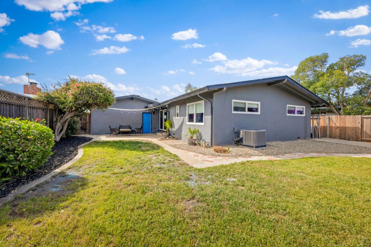 1430 Spruce Street Livermore, CA 94551 - Photo 29 of 32 a view of a house with swimming pool and yard