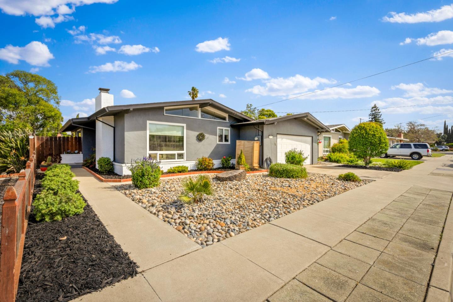 1430 Spruce Street Livermore, CA 94551 - Photo 31 of 32 a front view of a house with a garden