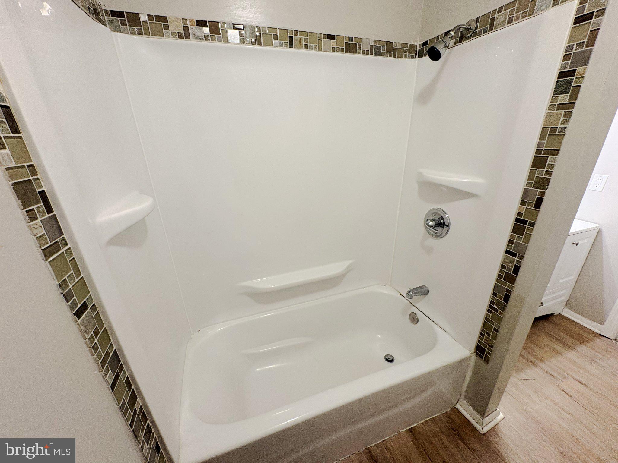 308 Via Cascata Drive Clementon, NJ 08021 - Photo 20 of 23 Modern tub with stylish tile accents.