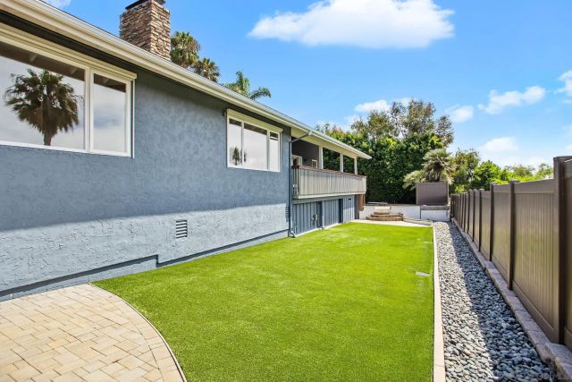 a view of a balcony with wooden floor