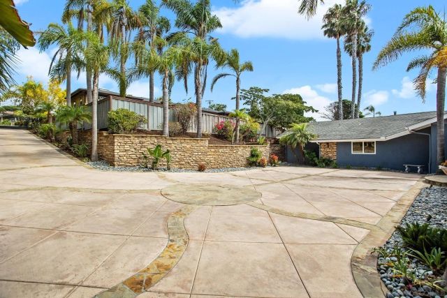 a view of a backyard with a trees