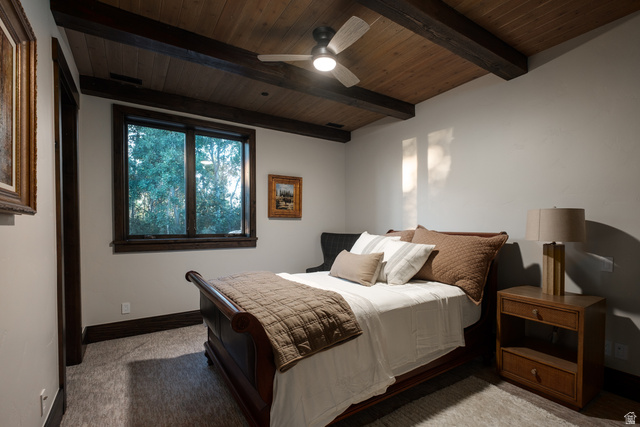 9156 Forest Road, Unit 24 Heber City, UT 84036 - Photo 24 of 42 Vaulted wood-finish ceiling with exposed beams